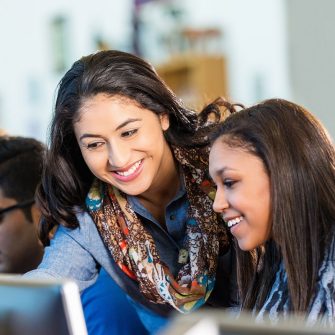 Image of teacher instructing students