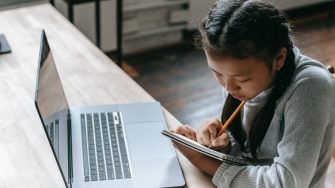 Female student at laptop