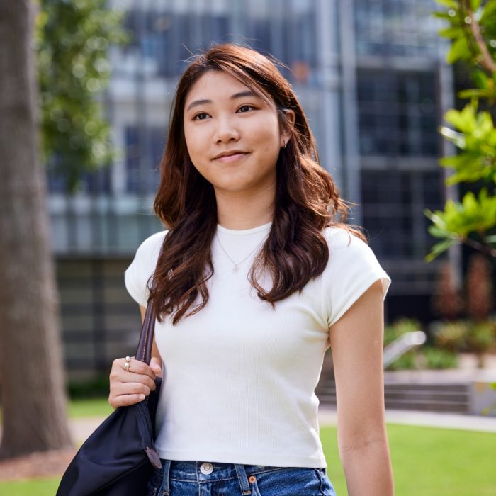 Young Student standing outside, main walkway UNSW College Student standing outside - main walkwayy