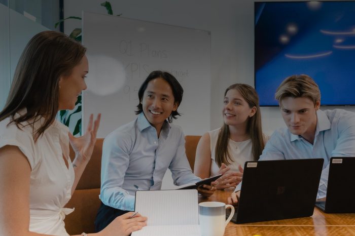 Applied Degree business students in meeting room