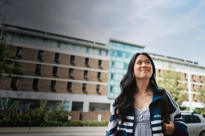 UNSW College Student, standing outside looking up