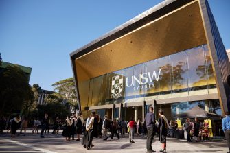 Students and family celebrate graduation.