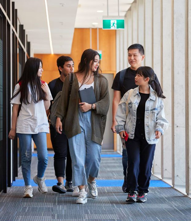 Group of students walking in hallway