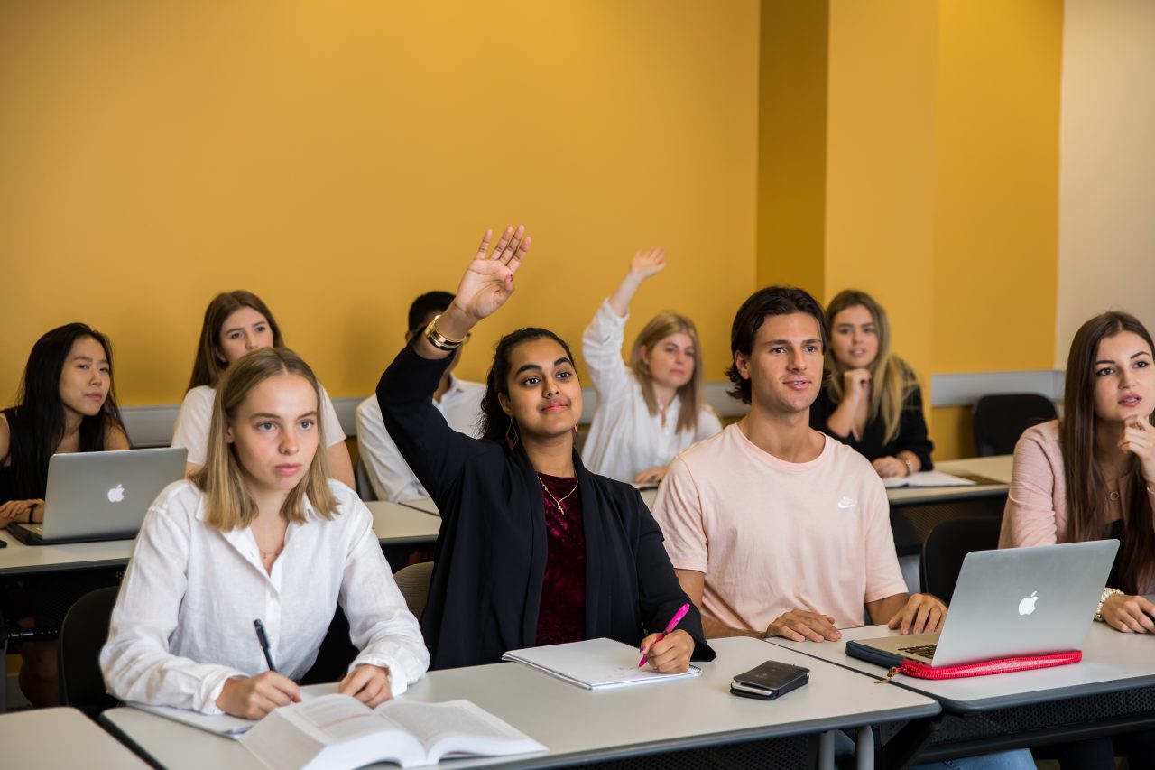 Students learning and participating in a class