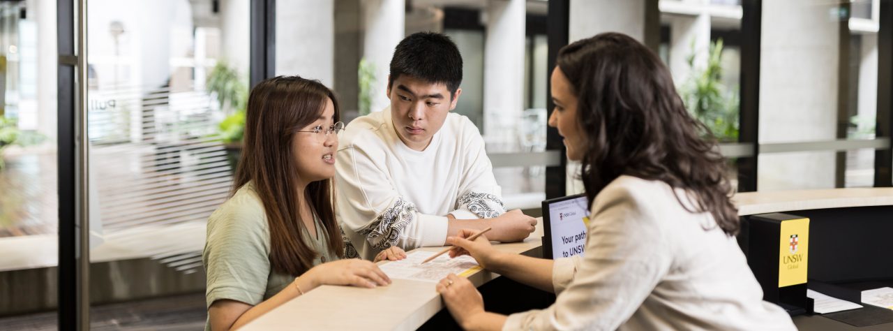 Student Services helping students at desk