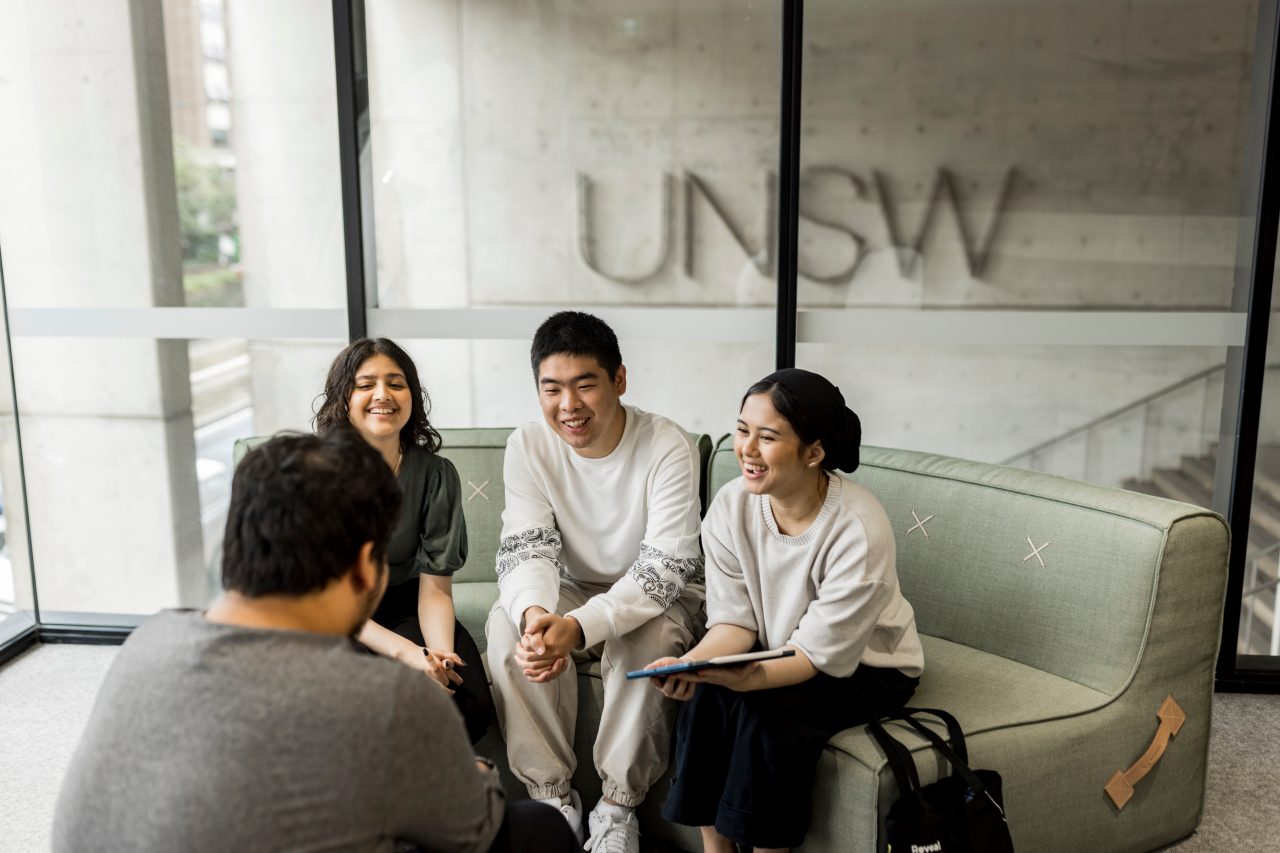 Students studying and talking in the Student Hub at L5