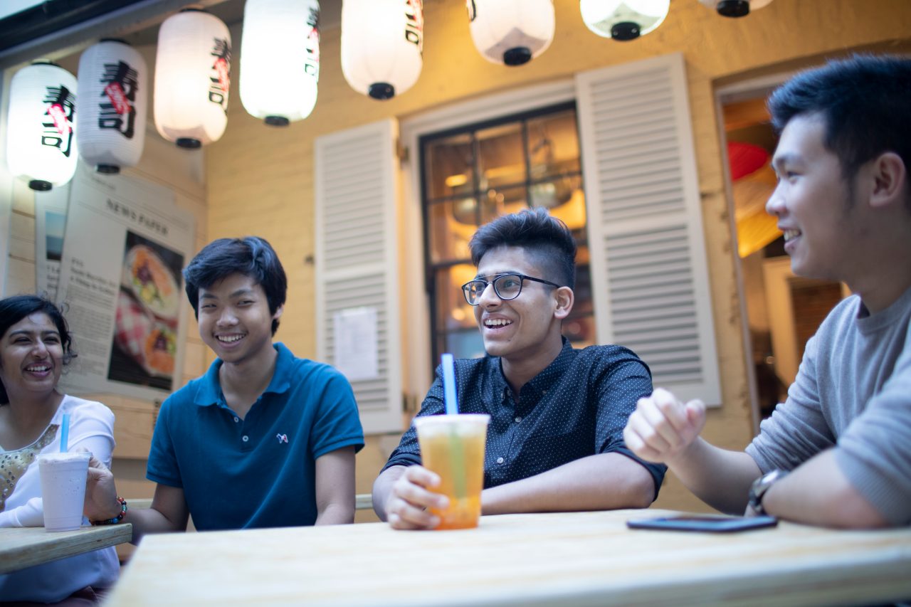 Students drinking bubble tea at Spice Alley